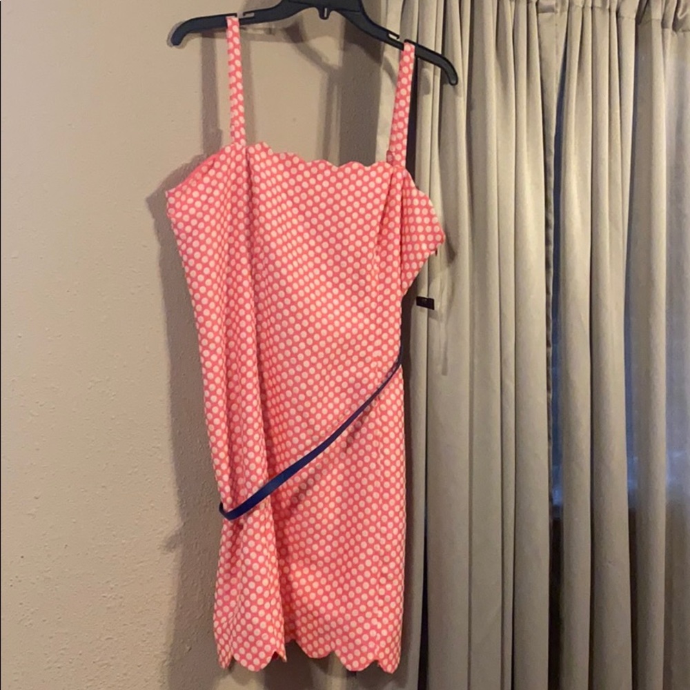 Pink and white polka dot dress.